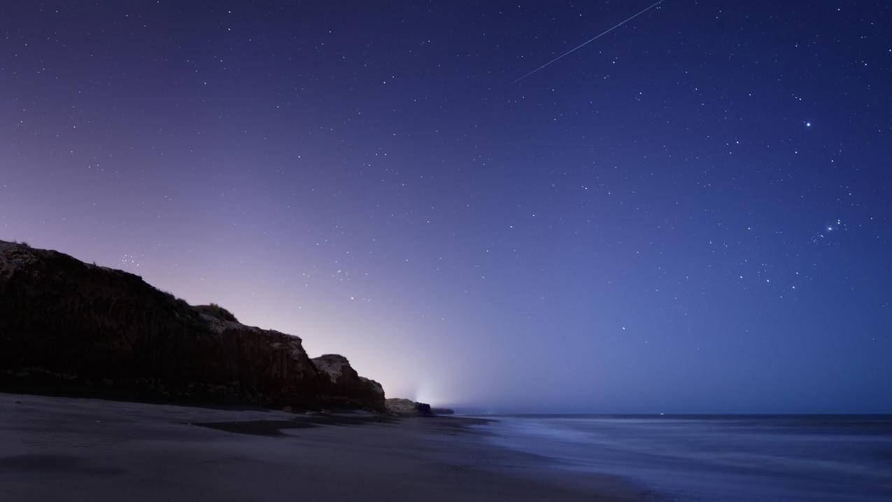 星星星空猎户座怪石海洋风景4k壁纸