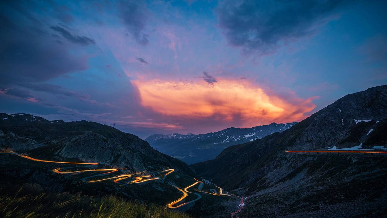 风景黄昏夕阳盘山公路4k图片